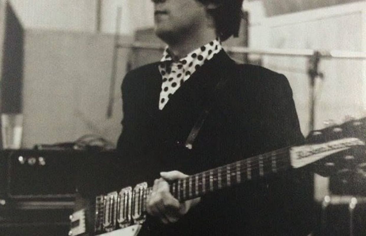 Photo De John Lennon Qui Joue De La Guitare