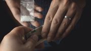 Addict man with money buying dose of cocaine or heroine or another narcotic from drug dealer. Drug abuse and traffic concept Addict man with money buying dose of cocaine or heroine or another narcotic from drug dealer. Drug abuse and traffic concept