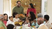 Family eating Thanksgiving dinner Family eating Thanksgiving dinner