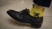 Chaussette de Dries Van Langenhove, fondateur de Schild en Vrienden, mouvement 'd'extrême droite en col blanc' Chaussette de Dries Van Langenhove, fondateur de Schild en Vrienden, mouvement 'd'extrême droite en col blanc'