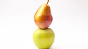 A pear balancing on an apple A pear balancing on an apple