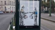 Des publicités dans des abris-bus détournées à Bruxelles pour lutter contre le Ceta et le TTIP Des publicités dans des abris-bus détournées à Bruxelles pour lutter contre le Ceta et le TTIP