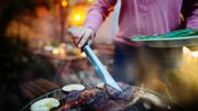Woman having a barbecue outdoor. Woman having a barbecue outdoor.
