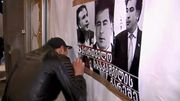 Les portes du palais des congrès, placardées d'affiches hostiles à la tenue du meeting (image extraite d"'un reportage de la chaîne Imedi) Les portes du palais des congrès, placardées d'affiches hostiles à la tenue du meeting (image extraite d"'un reportage de la chaîne Imedi)