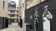 L'autre accès de l'îlot se fait un peu plus haut par "l'Impasse de la tête de boeuf", il donne aussi accès à un nouveau parking pour voitures en sous-sol de 24 places L'autre accès de l'îlot se fait un peu plus haut par "l'Impasse de la tête de boeuf", il donne aussi accès à un nouveau parking pour voitures en sous-sol de 24 places