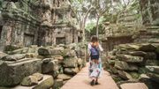 Rear View Of Woman Visiting Old Ancient Temples Rear View Of Woman Visiting Old Ancient Temples