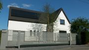 Maison contemporaine en briques sombres à Montigny-le-Tilleul Maison contemporaine en briques sombres à Montigny-le-Tilleul