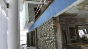 L'ancien bâtiment des années 60 qui accueillait le Mad café a été préservé à l'intérieur L'ancien bâtiment des années 60 qui accueillait le Mad café a été préservé à l'intérieur