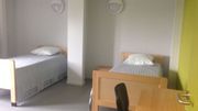 Des chambres simples et lumineuses avec tout le confort Des chambres simples et lumineuses avec tout le confort