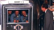 Le président Nixon et l'équipage d'Apollo 11 en quarantaine après leur retour sur terre Le président Nixon et l'équipage d'Apollo 11 en quarantaine après leur retour sur terre