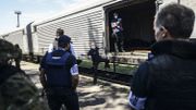 Les enquêteurs néerlandais ont pu examiner les corps des victimes dans les wagons réfrigérés. Les enquêteurs néerlandais ont pu examiner les corps des victimes dans les wagons réfrigérés.