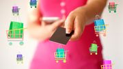 online shopping. close-up of hands using touch screen smartphone and holding credit card online shopping. close-up of hands using touch screen smartphone and holding credit card