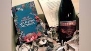 "Enlivrez-vous" avec un bouquin et une bouteille de vin "Enlivrez-vous" avec un bouquin et une bouteille de vin