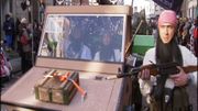 Un char caricaturait les terroristes du groupe terroriste Etat islamique en 2015 à Alost. Un char caricaturait les terroristes du groupe terroriste Etat islamique en 2015 à Alost.
