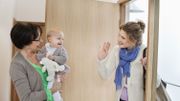 Woman waving to her daughter Woman waving to her daughter
