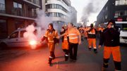Des travailleurs dans le centre d'Anvers ce lundi matin Des travailleurs dans le centre d'Anvers ce lundi matin