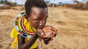 African girl from Samburu tribe drinking fresh water, East Africa African girl from Samburu tribe drinking fresh water, East Africa