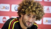 Fellaini, sa coupe afro et ses mèches blondes. Fellaini, sa coupe afro et ses mèches blondes.