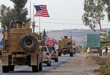 Un convoi américain quitte la Syrie. Un convoi américain quitte la Syrie.