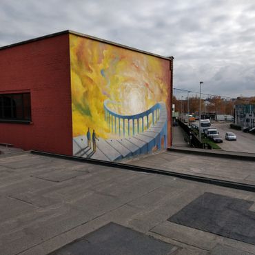 Deuxième fresque : les murs deviennent un pont qui mène Bassam Aramin et Rami Elhanan vers la paix Deuxième fresque : les murs deviennent un pont qui mène Bassam Aramin et Rami Elhanan vers la paix