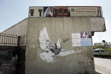 Dans les territoires palestiniens, Banksy est considéré comme un porte-drapeau Dans les territoires palestiniens, Banksy est considéré comme un porte-drapeau