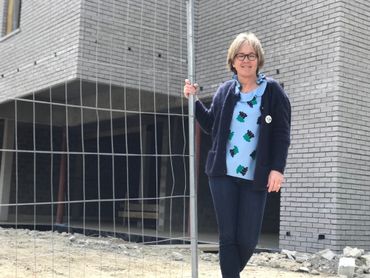 Evelyne Kaesmacher-Lenaers, commerçante et investisseur immobilier devant le chantier de son immeuble Evelyne Kaesmacher-Lenaers, commerçante et investisseur immobilier devant le chantier de son immeuble